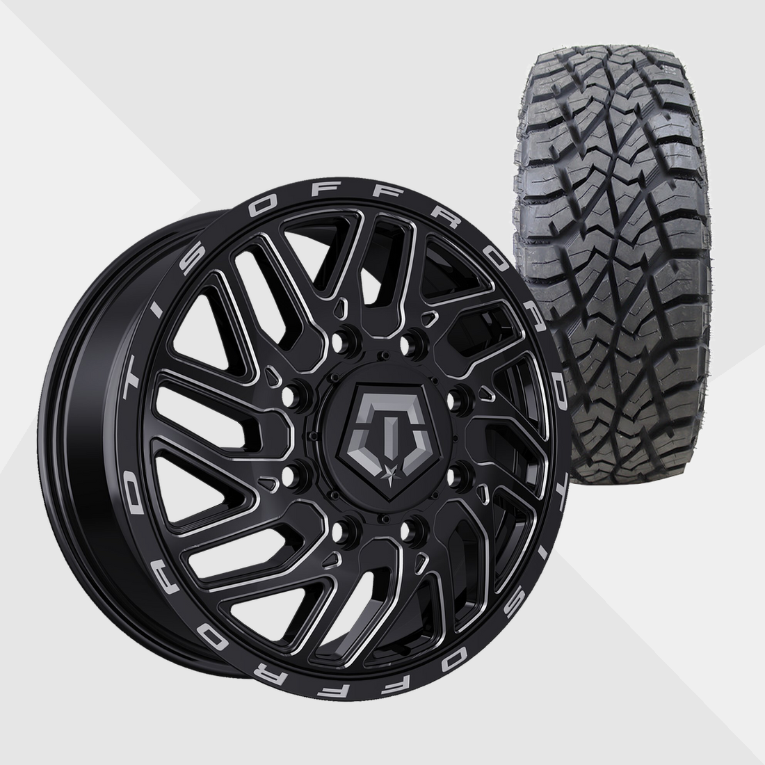 TIS 544BM Gloss Black Milled 22x8.25 8x200 with AMP Tires Terrain Attack R/T 33x12.50R22 Dually Package
